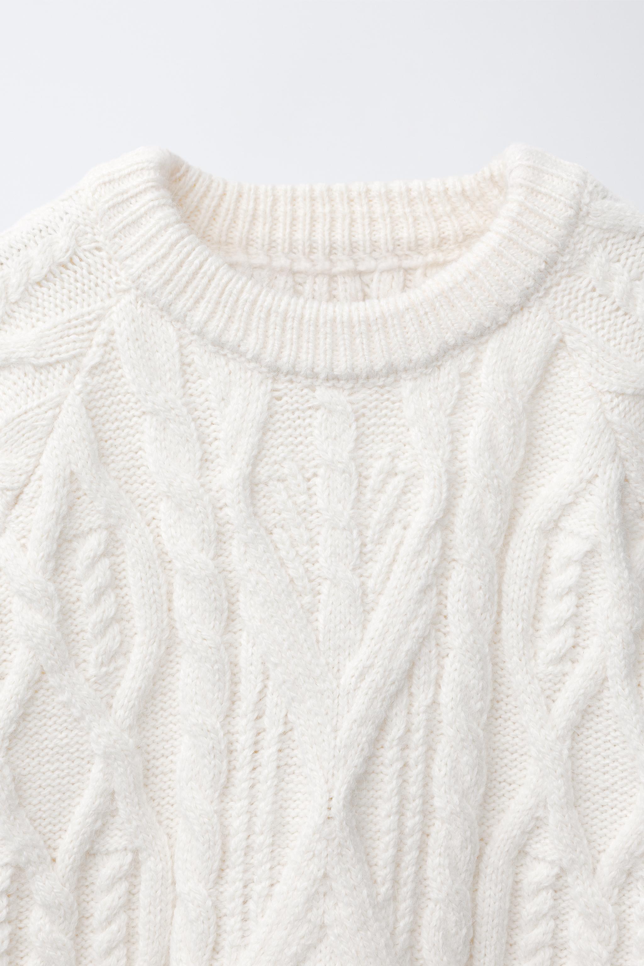 CABLE KNIT SWEATER